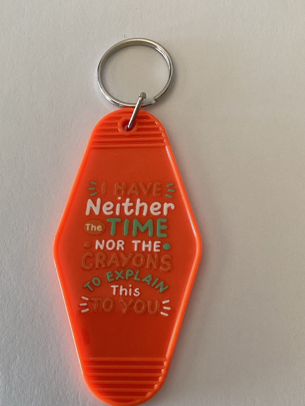 Orange Novelty Keychain with Humorous Quote